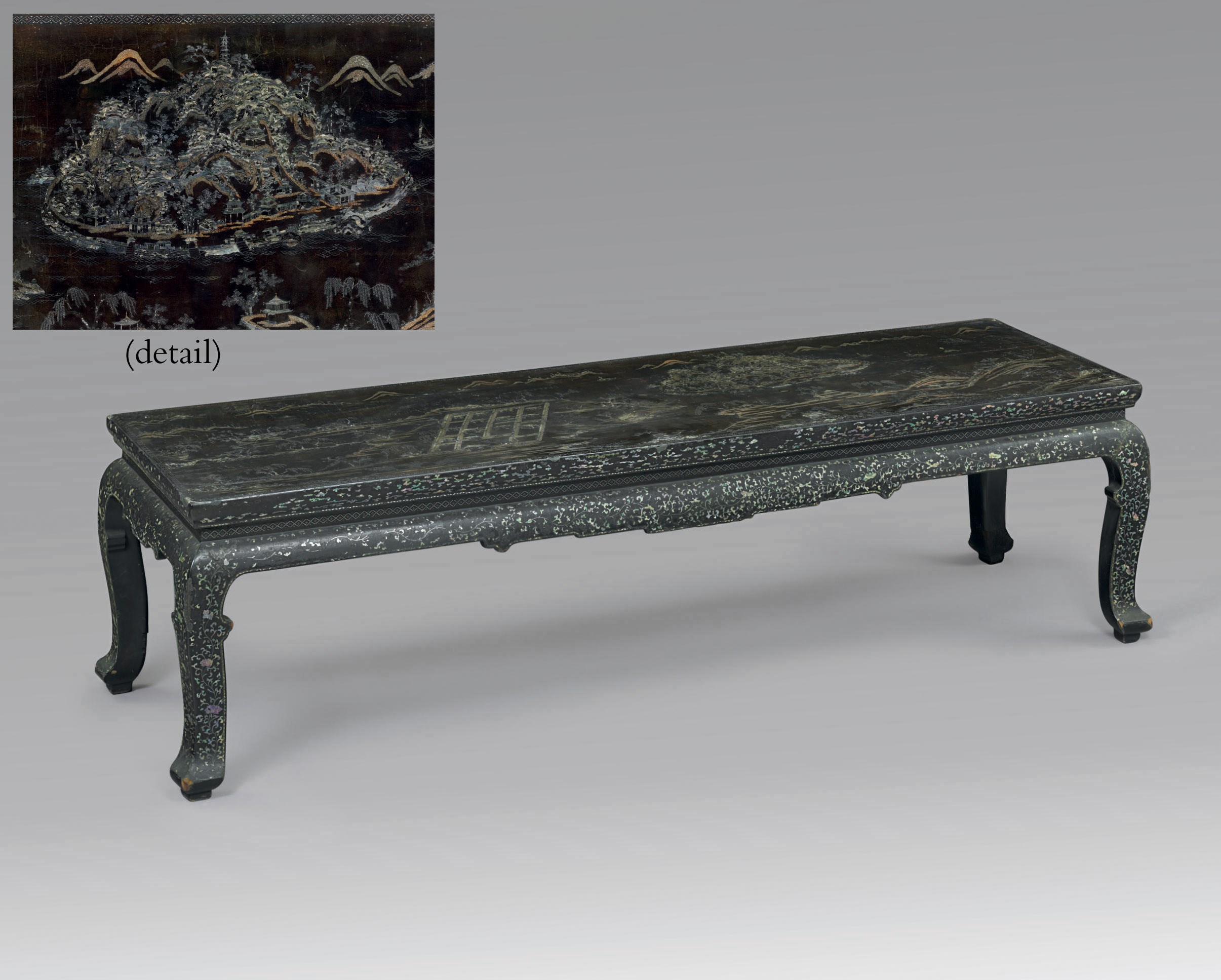 A RARE AND UNUSUAL MOTHER-OF-PEARL-INLAID LACQUERED CORNER-LEG TABLE