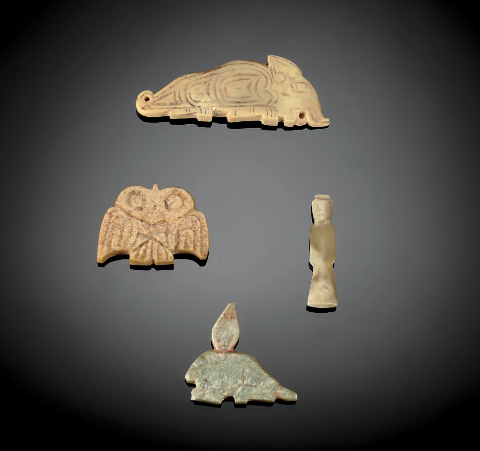 FOUR SMALL JADE FIGURAL PENDANTS
