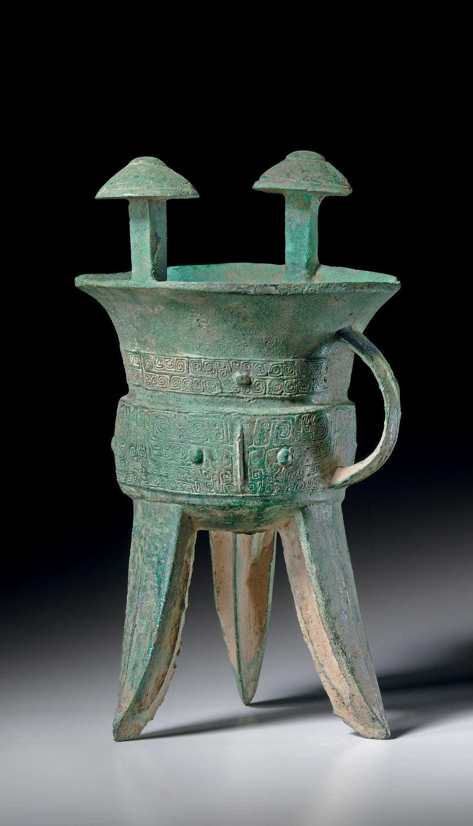 A BRONZE TRIPOD WINE VESSEL, JIA