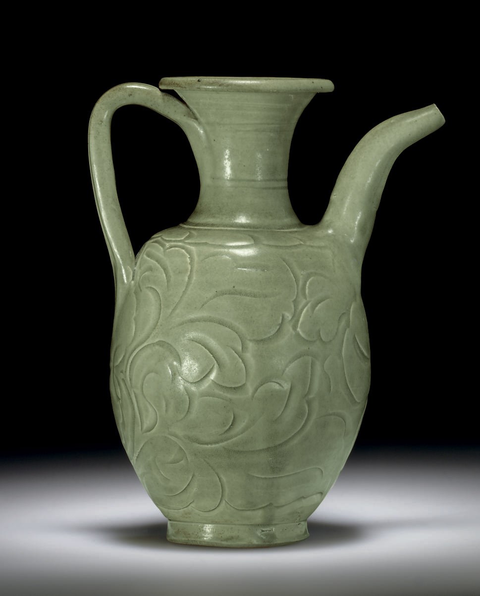 A RARE YAOZHOU CELADON CARVED EWER