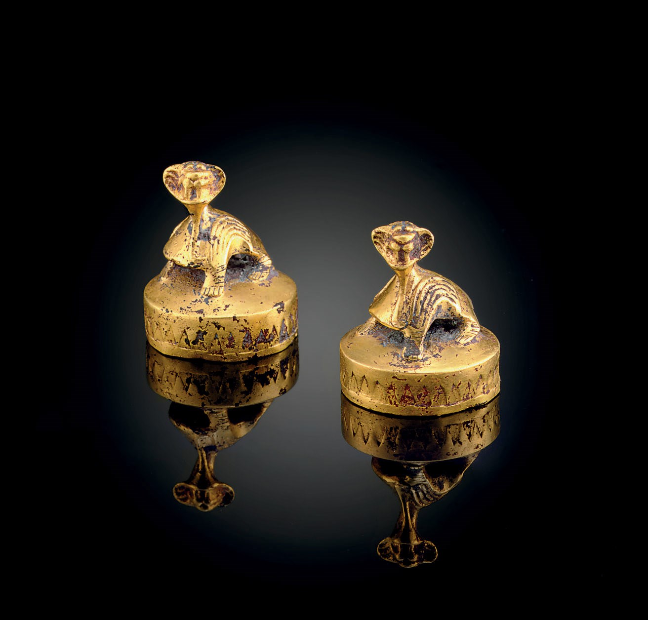 A RARE PAIR OF SMALL GOLD CIRCULAR FITTINGS