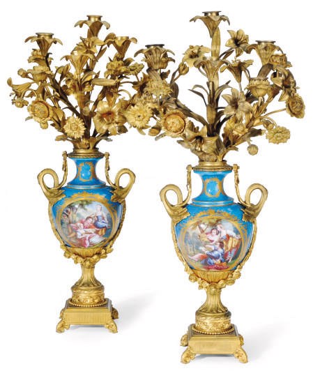 A PAIR OF SEVRES STYLE TURQUOISE-GROUND VASES MOUNTED AS SIX-LIGHT CANDELABRA,