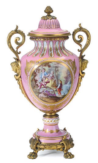 A PAIR OF LARGE GILT-METAL MOUNTED SEVRES STYLE PINK-GROUND JEWELED VASES AND COVERS,