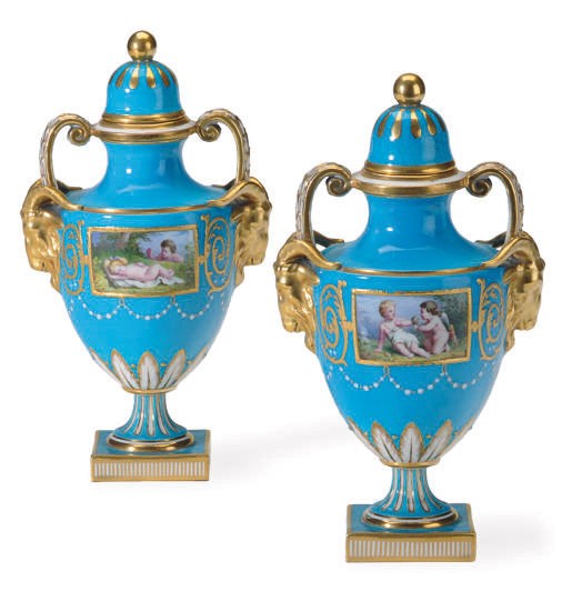 A PAIR OF SEVRES STYLE TURQUOISE-GROUND VASES AND COVERS,