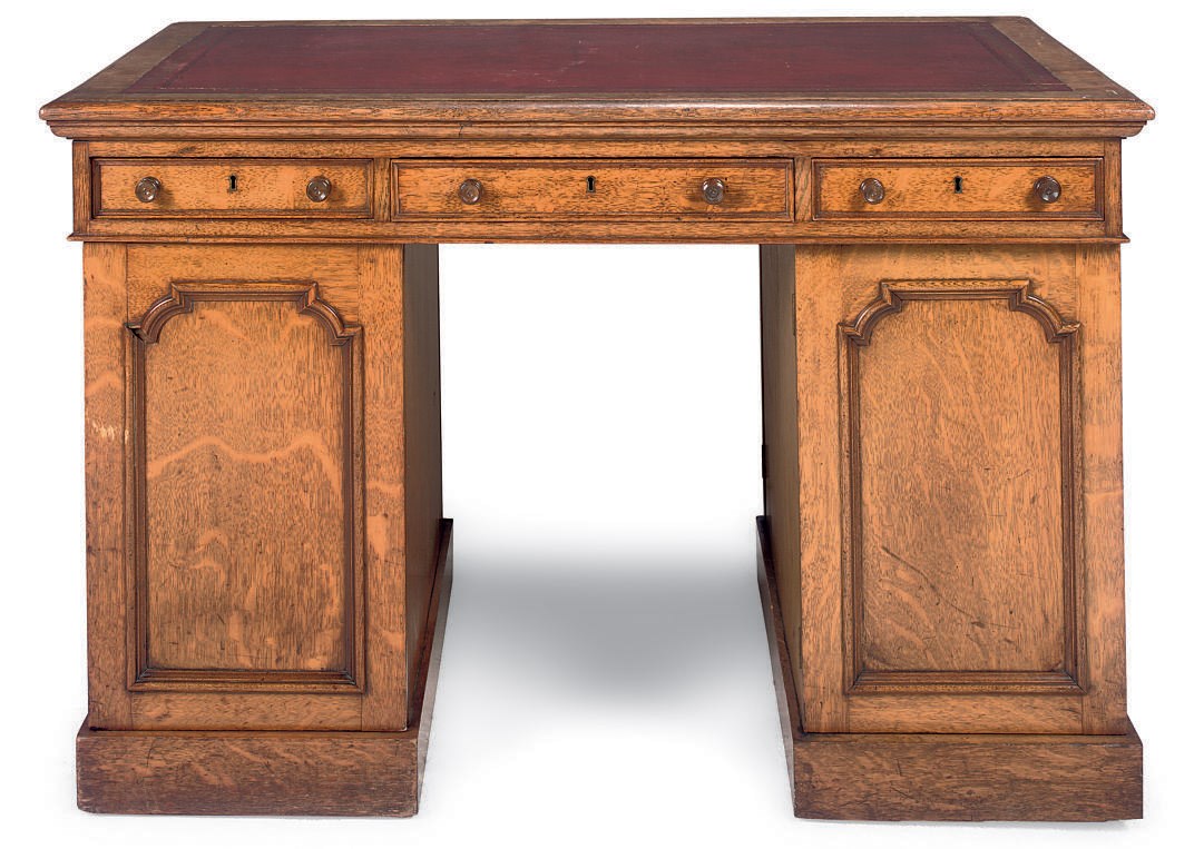 A MID-VICTORIAN OAK PEDESTAL DESK