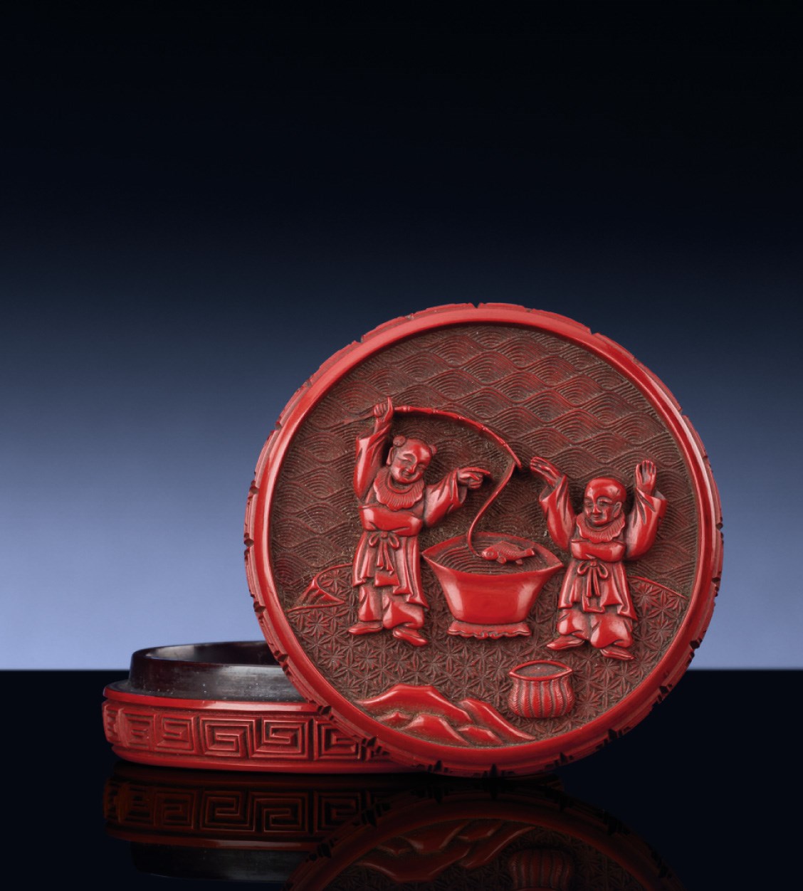 A SMALL MING CINNABAR LACQUER BOX AND COVER