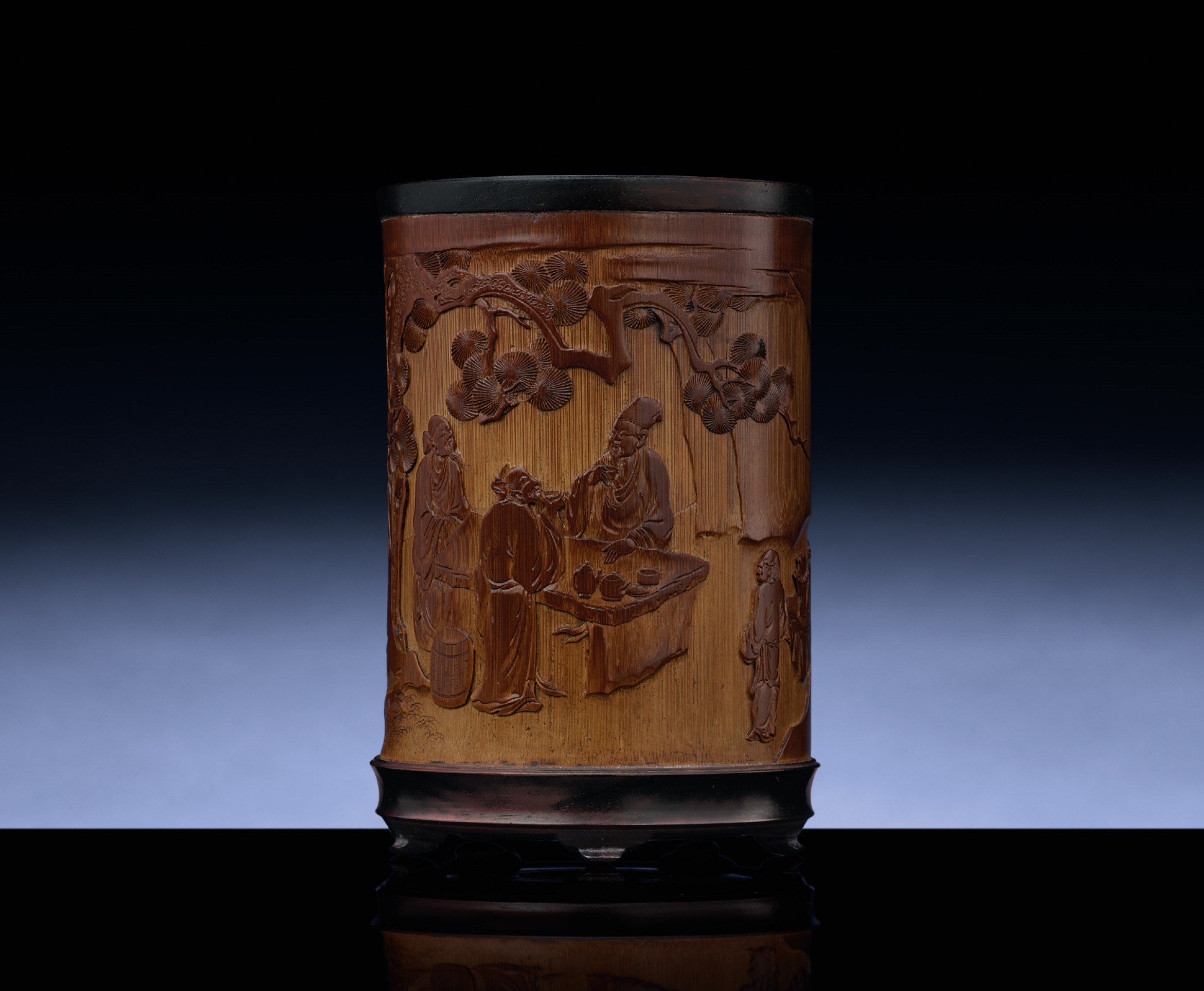 A FINELY CARVED 'TEA GATHERING' BAMBOO BRUSHPOT