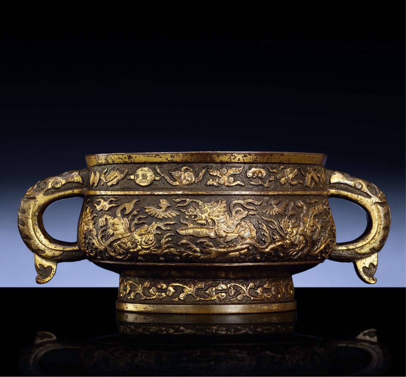 A PARCEL-GILT BRONZE CENSER