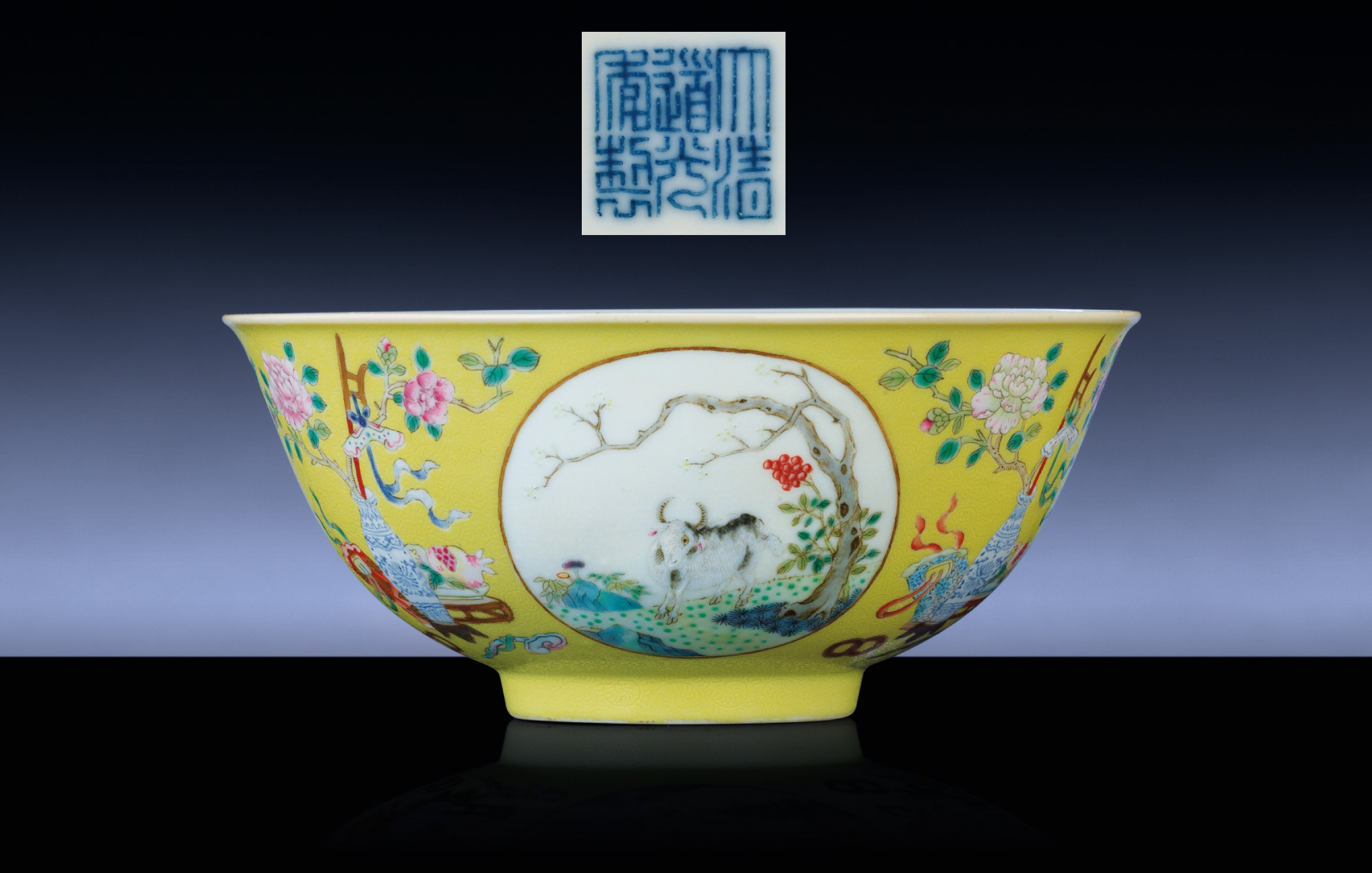 A FINE YELLOW-GROUND FAMILLE ROSE 'MEDALLION' BOWL