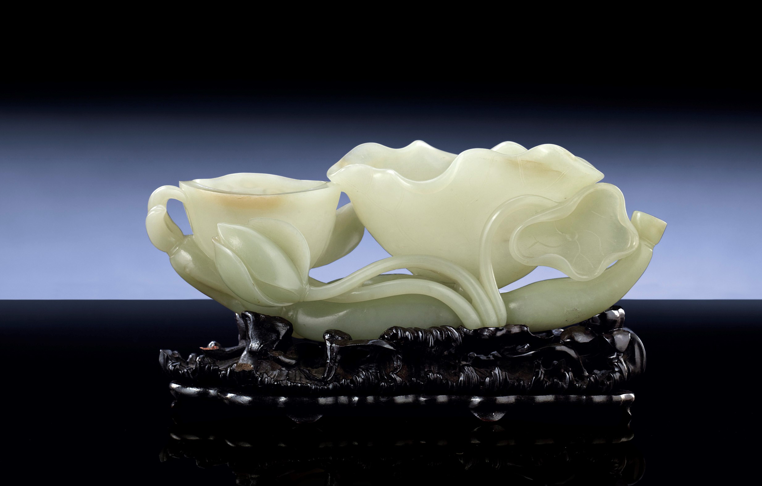 A PALE CELADON JADE LOTUS GROUP