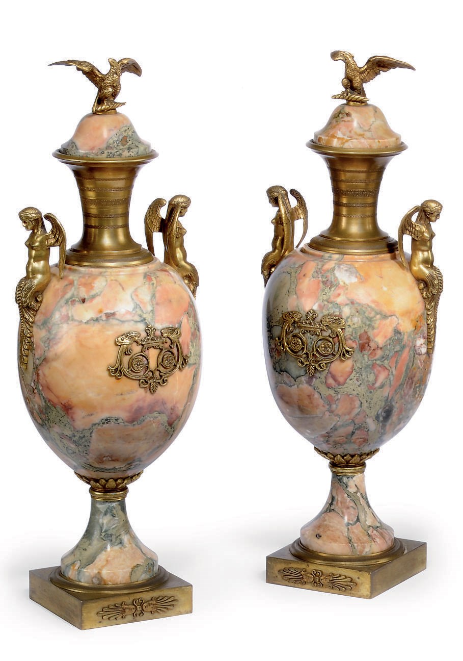 A PAIR OF FRENCH PINK MARBLE AND GILT-BRONZE URNS