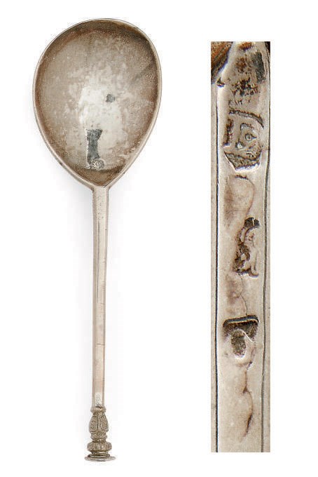 A JAMES I PARCEL-GILT SILVER SEAL-TOP SPOON
