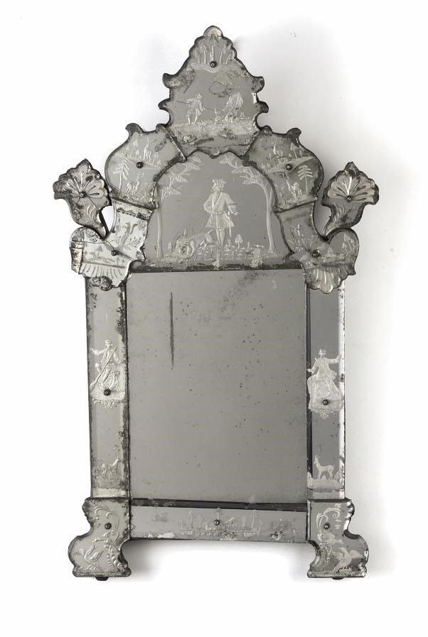 A GERMAN ETCHED MIRROR