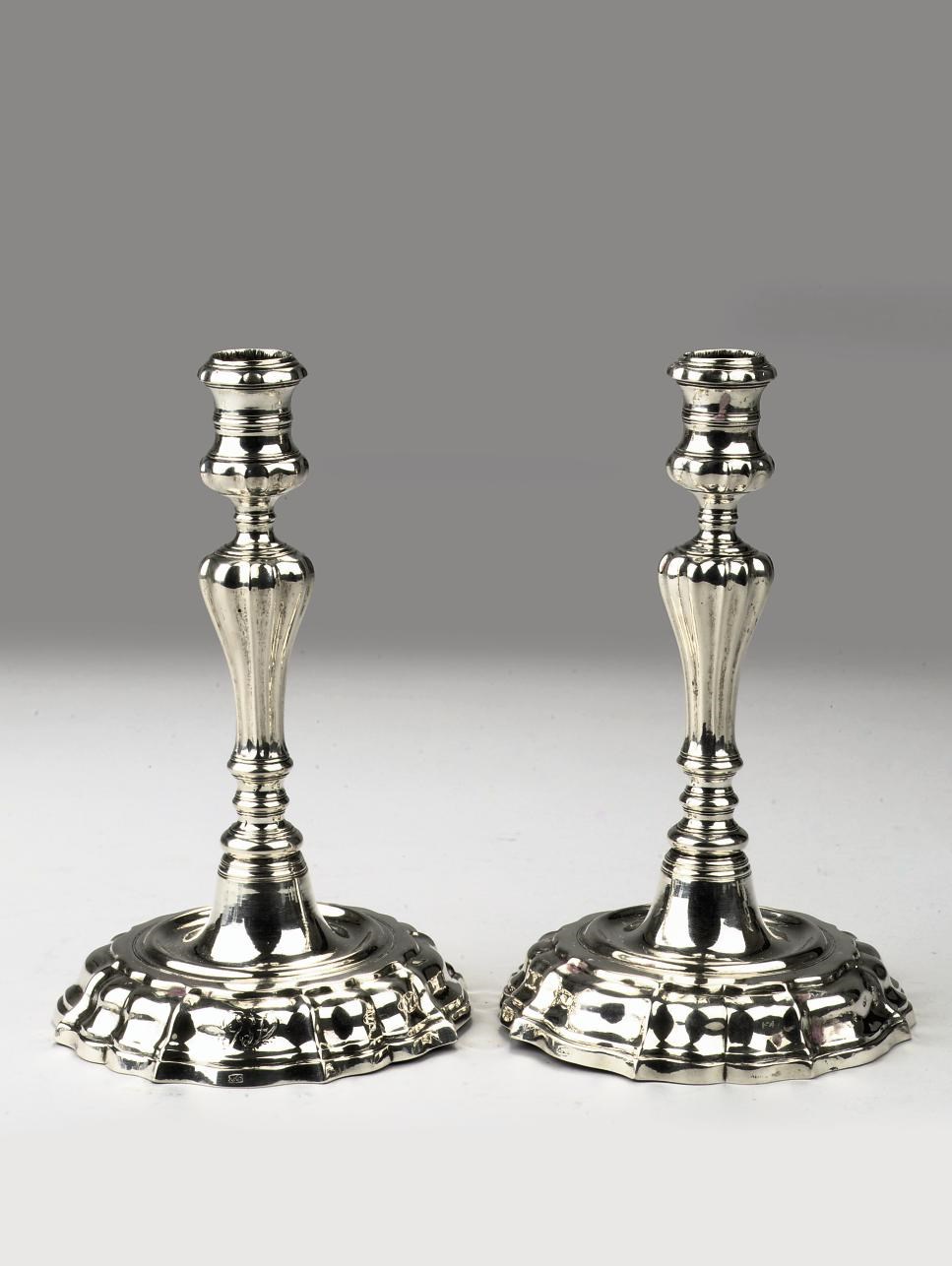 A pair of silver candlesticks