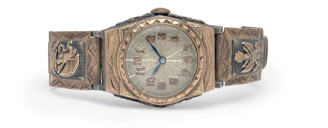 A SILVER AND GOLD WRISTWATCH