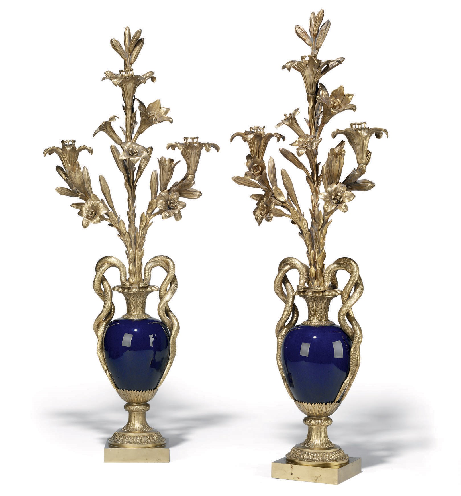 A PAIR OF FRENCH ORMOLU AND BEAU BLEU PORCELAIN THREE-LIGHT CANDELABRA