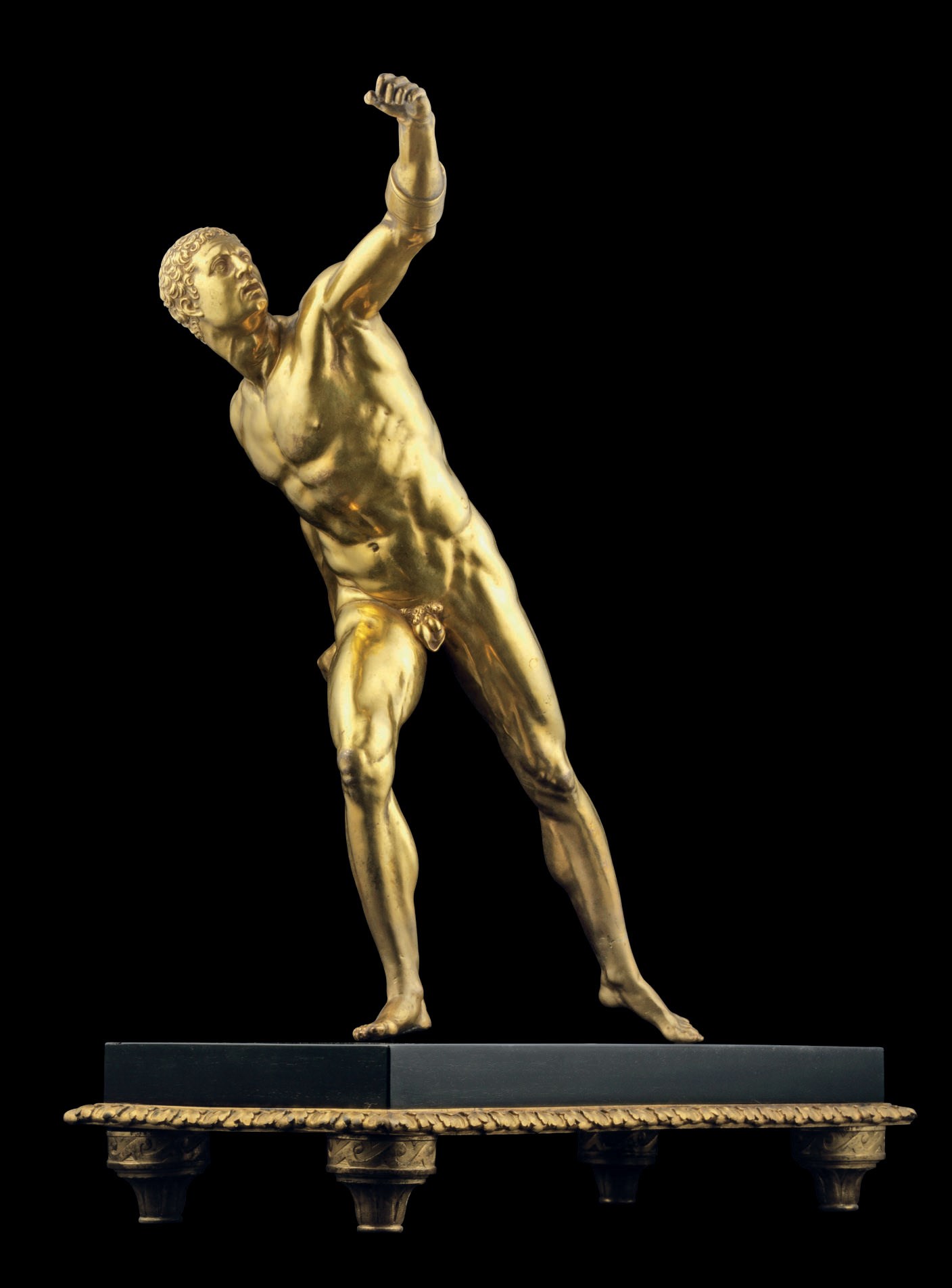 A GILT-BRONZE FIGURE OF THE BORGHESE GLADIATOR