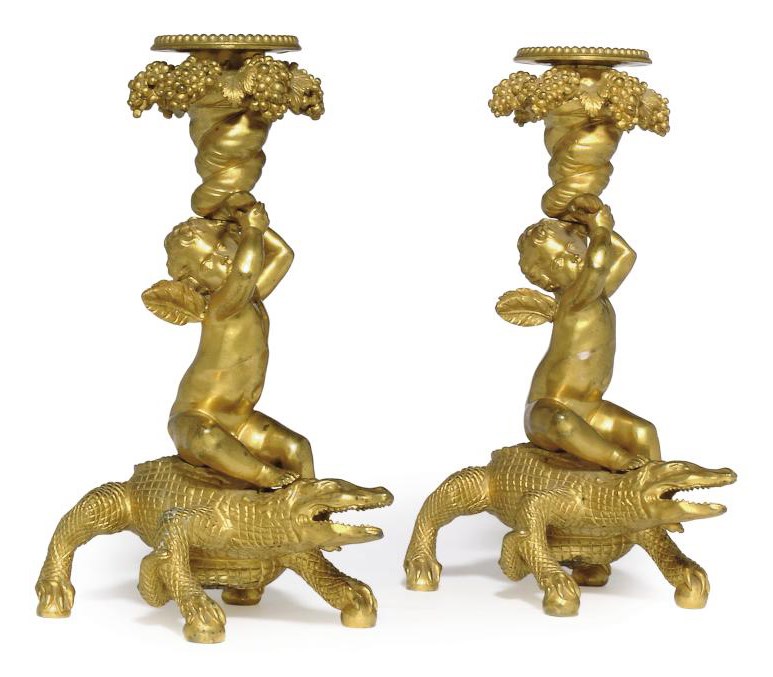 TWO GILT-BRONZE CANDLESTICKS
