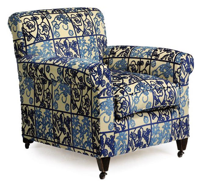 A STAINED WALNUT ARMCHAIR
