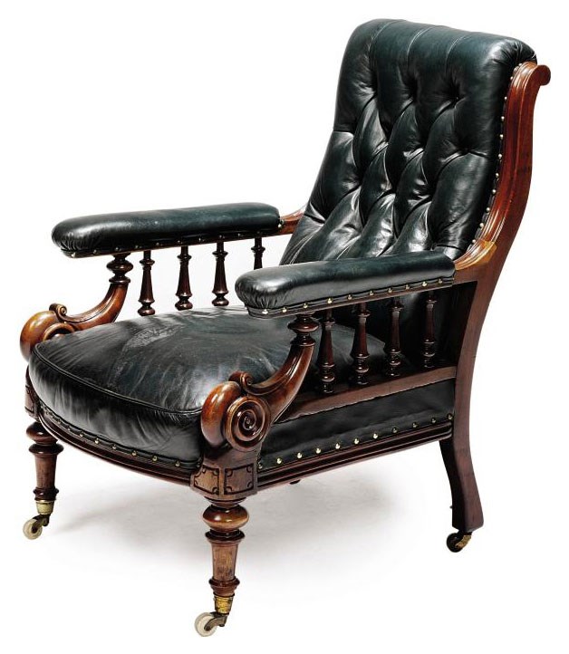 A VICTORIAN MAHOGANY LIBRARY ARMCHAIR