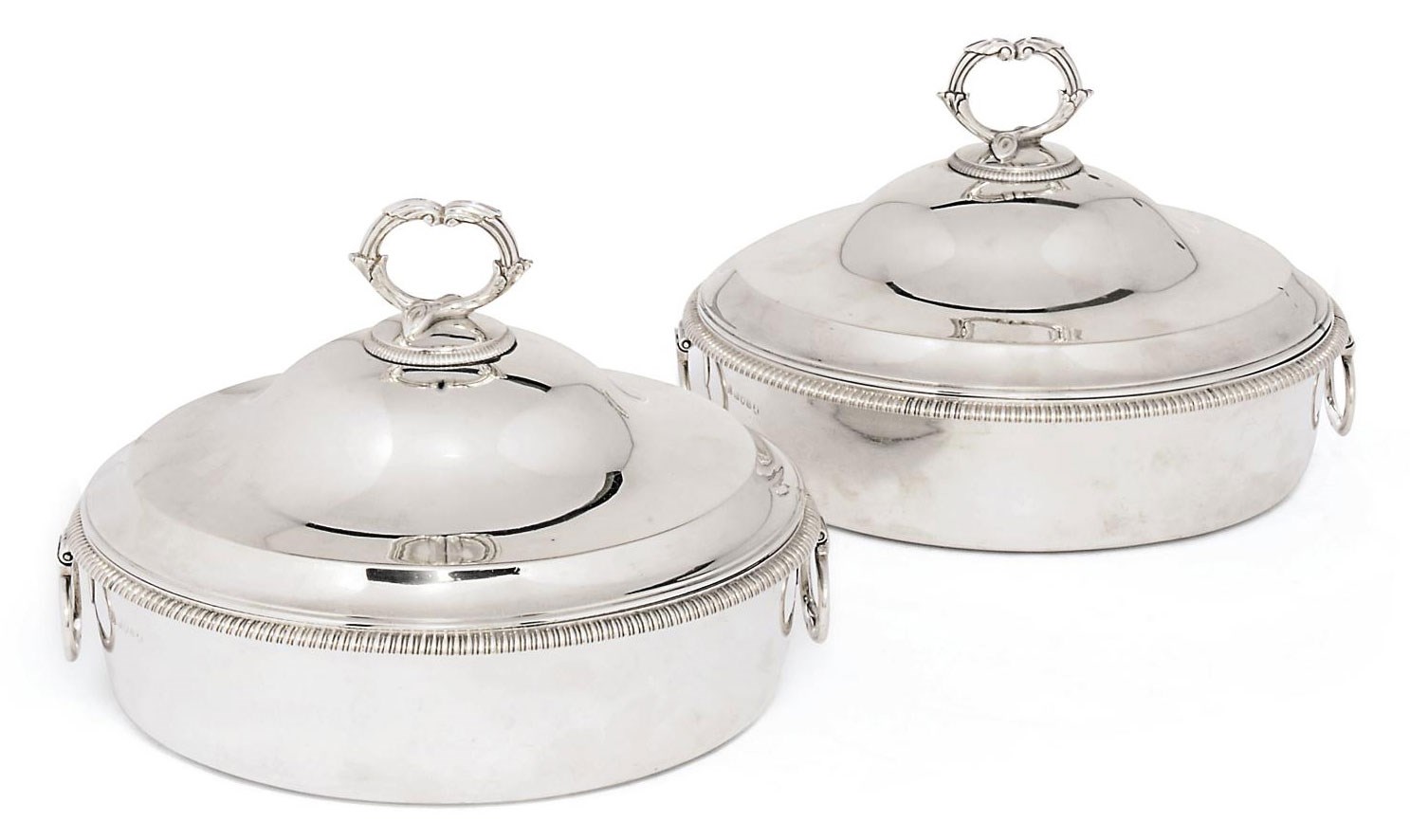 A PAIR OF GEORGE III CIRCULAR SILVER VEGETABLE DISHES AND COVERS