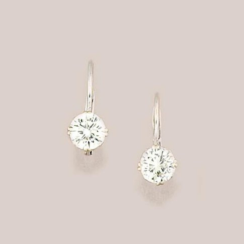 A pair of diamond single-stone earrings