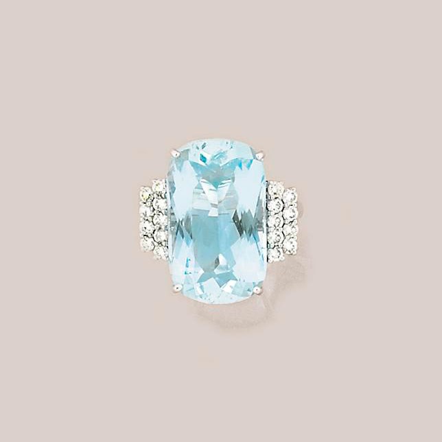 An aquamarine and diamond ring