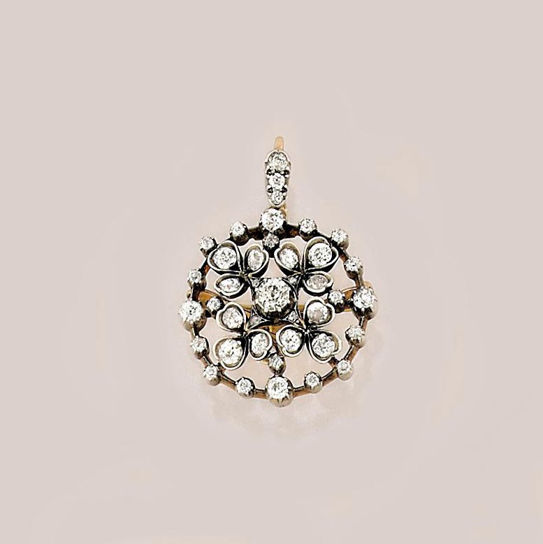 A diamond brooch/pendant
