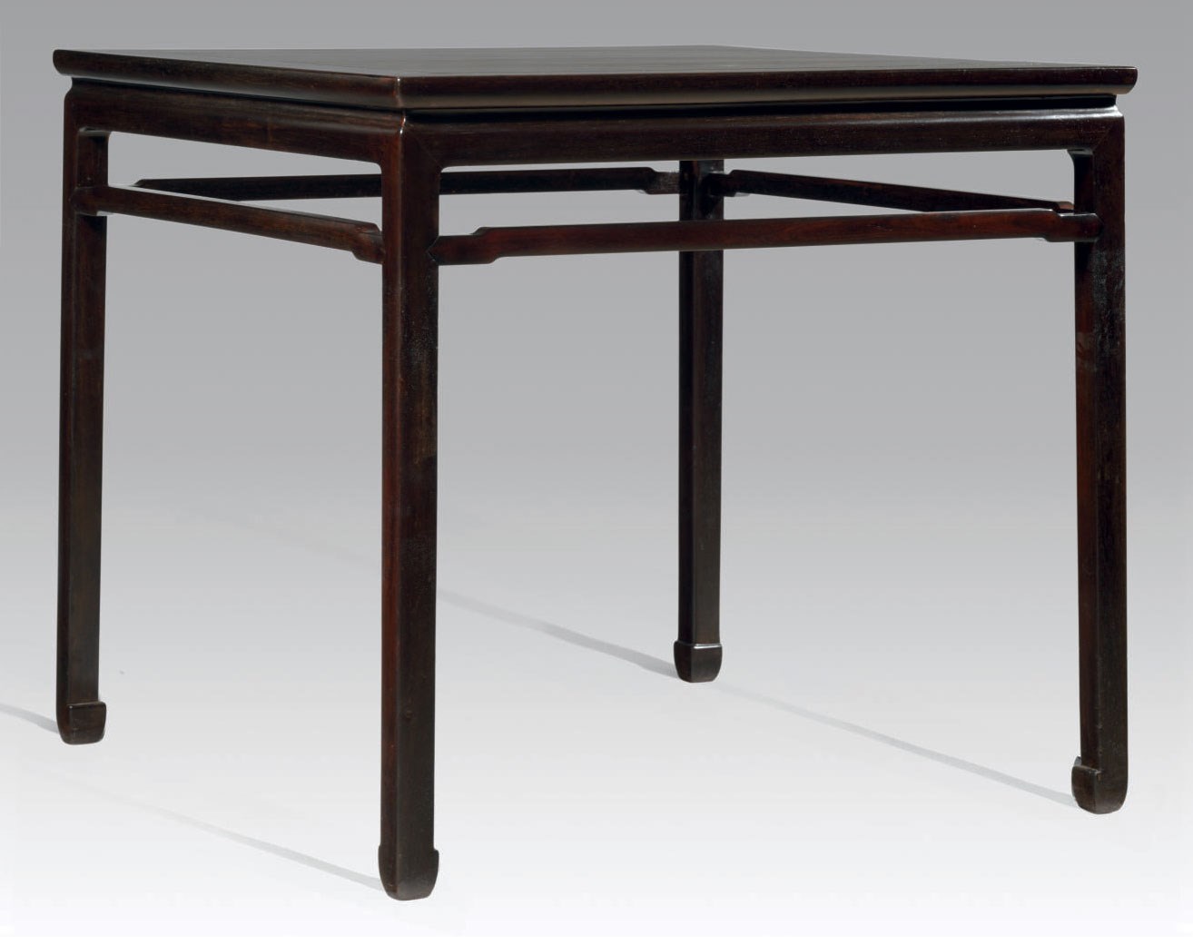 A ZITAN WAISTLESS SQUARE CORNER-LEG TABLE