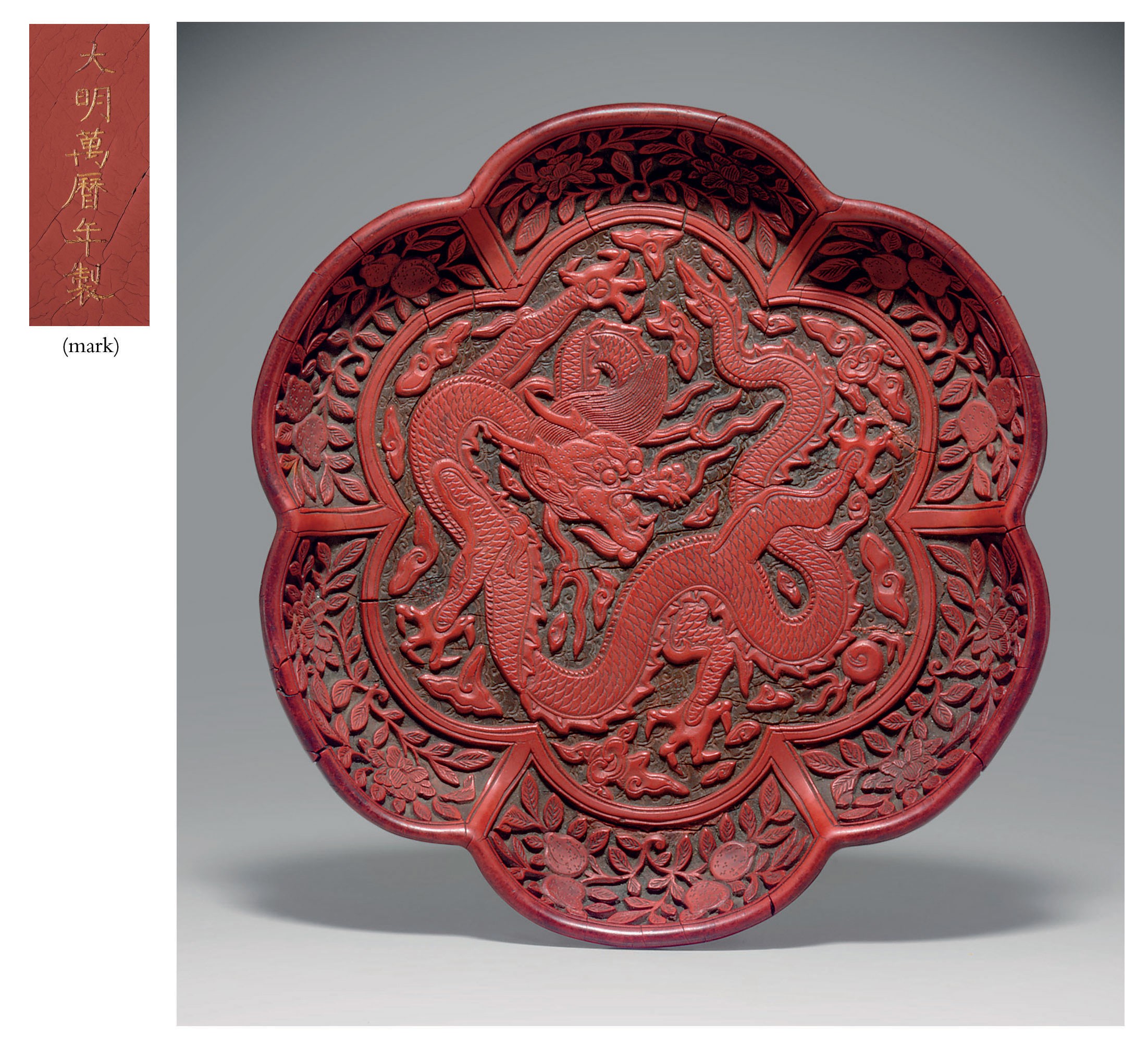 A RARE CARVED RED AND BROWN LACQUER 'DRAGON' DISH