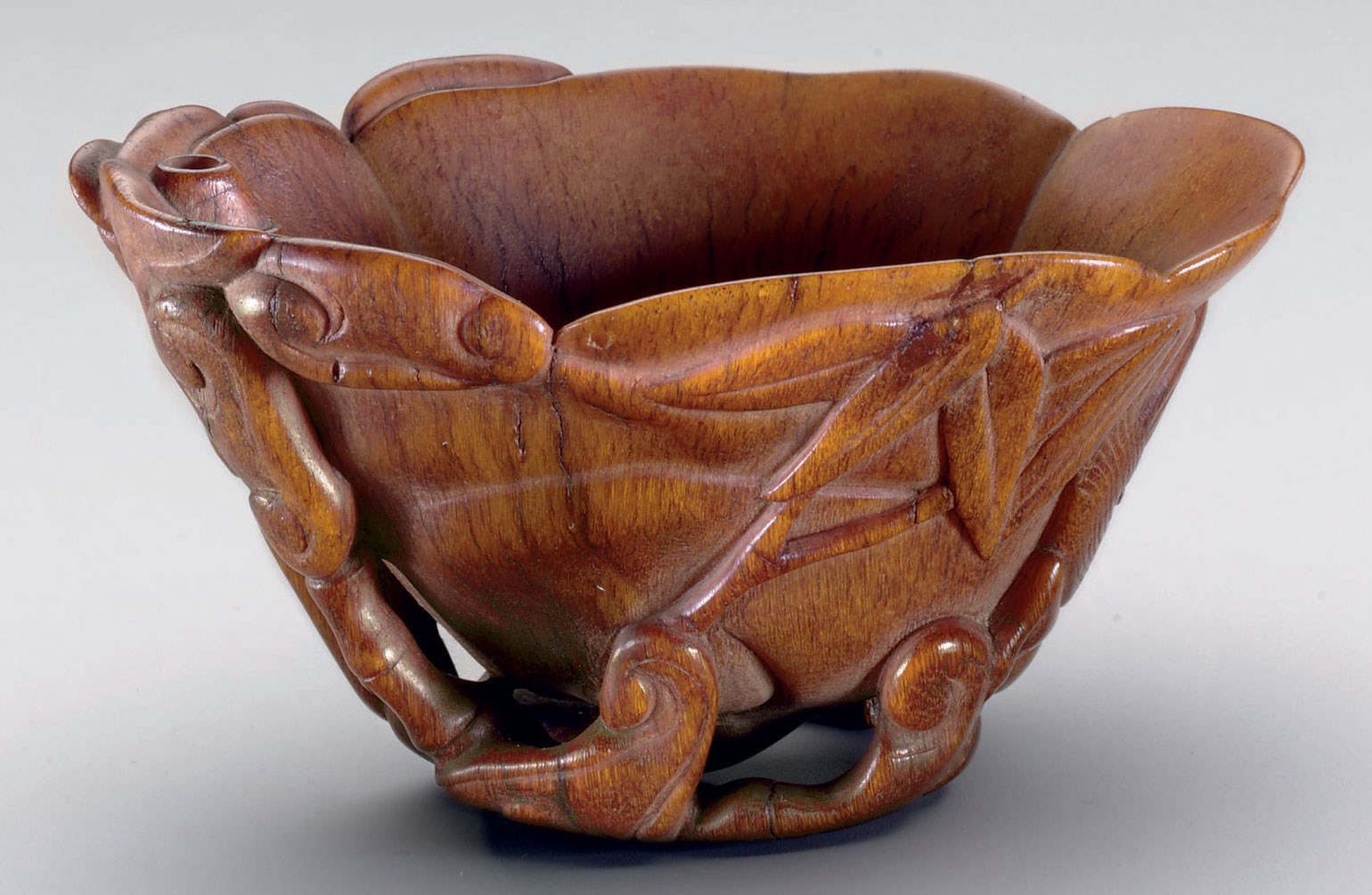 A SMALL RHINOCEROS HORN CUP