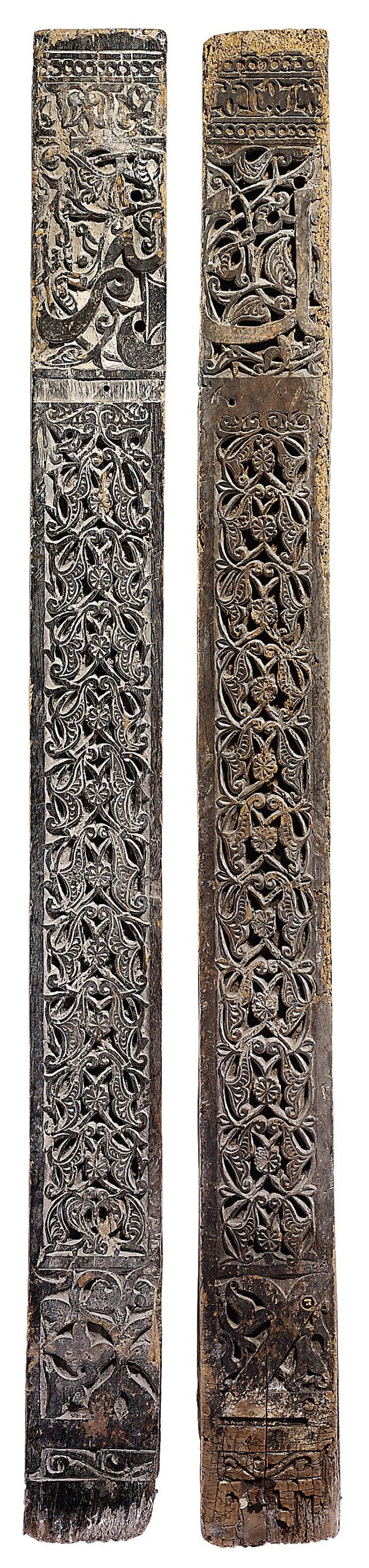 TWO CARVED WOODEN CORNER POSTS
