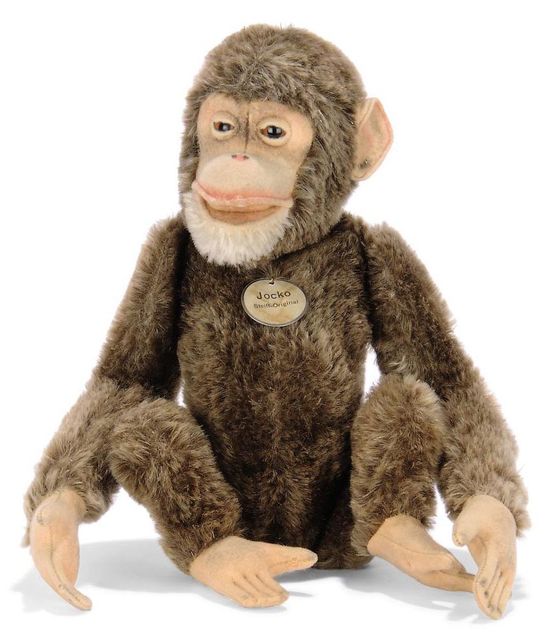 A STEIFF JOINTED MOHAIR JOCKO, (5325), brown, brown and black glass eyes, felt face, ears, hands and feet, open mouth, white mohair chin, swivel head, inoperative squeaker, FF button and white card chest tag with metal rim, circa 1910 --13in. (34cm.) high (slight fading, felt a little discoloured, mohair a little dry and water-stain to tag)