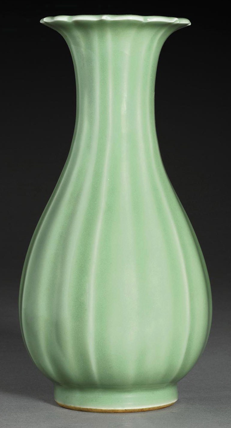 A LONGQUAN CELADON FLUTED PEAR-SHAPED VASE