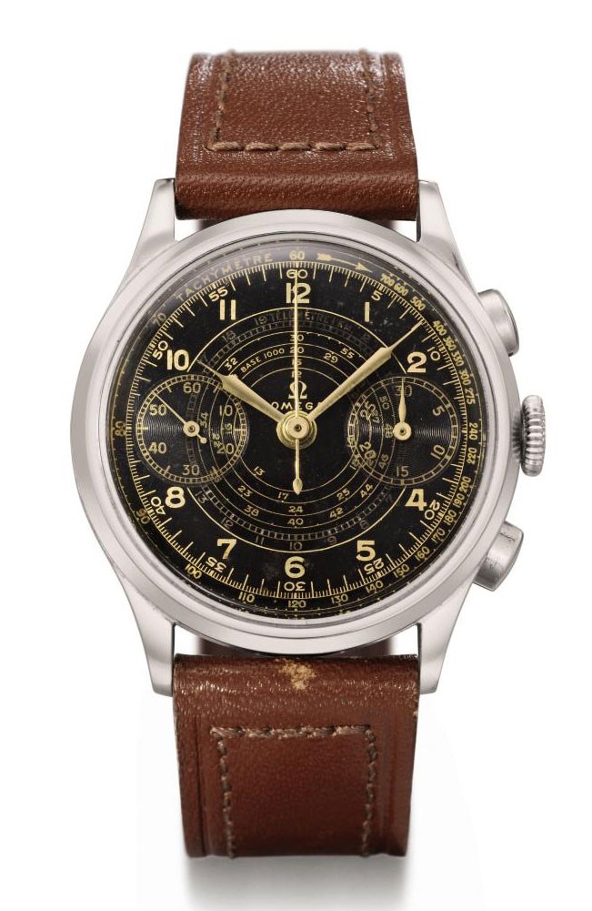 Omega. A large and very attractive stainless steel chronograph wristwatch with black lacquer dial