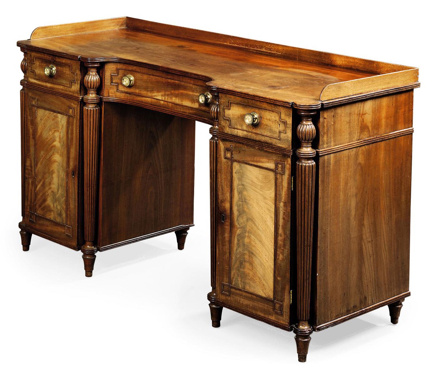 A REGENCY MAHOGANY KNEEHOLE DRESSING-TABLE