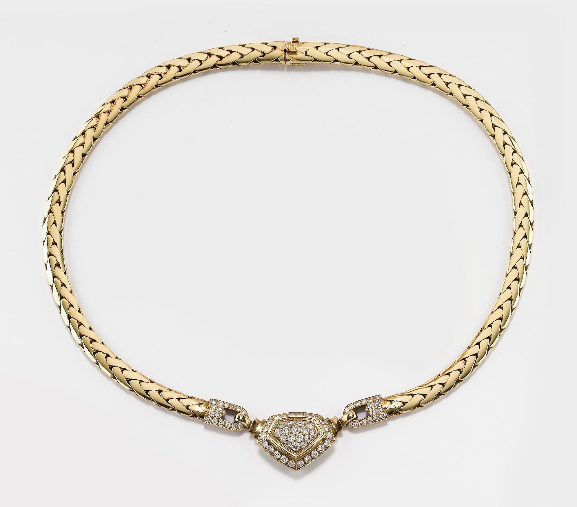GIROCOLLO IN ORO E BRILLANTI, FIRMATO CARTIER PARIS