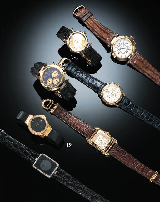 A LADY'S 18K GOLD AND DIAMOND WRISTWATCH WITH DATE, BY HUBLOT