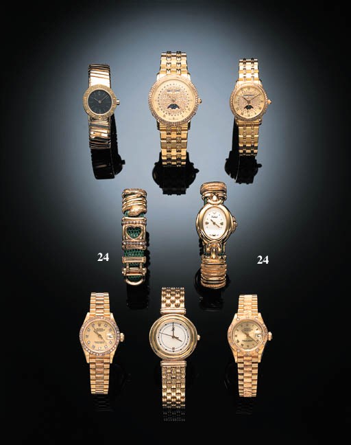 A LADY'S GILT OVAL-SHAPED WRISTWATCH AND BRACELET, BY TABBAH