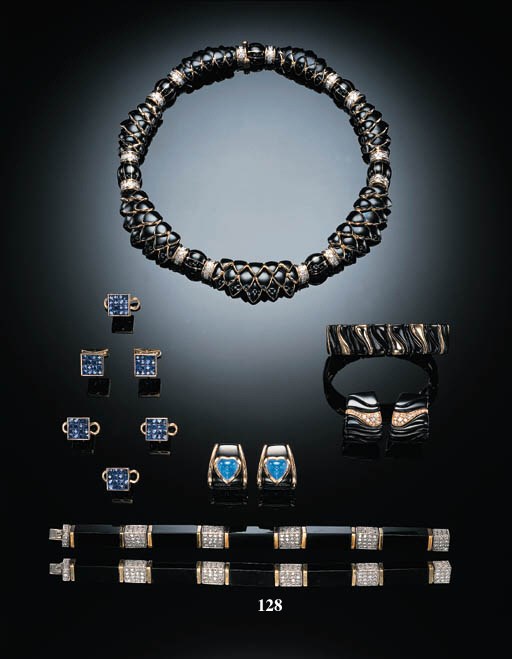 A PAIR OF DIAMOND AND BLACK ONYX BRACELETS