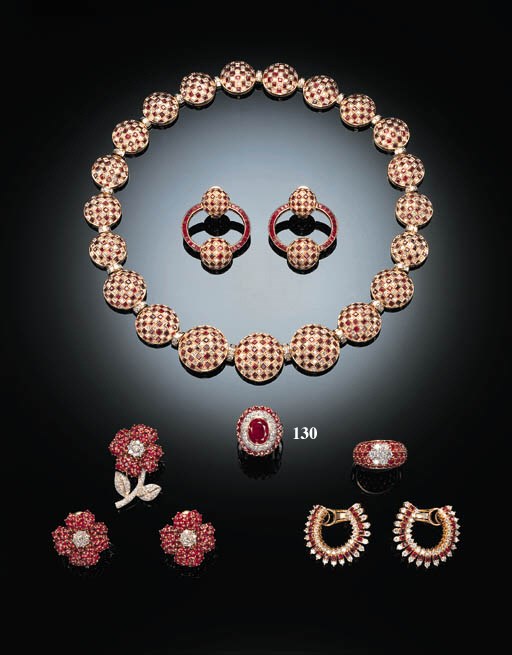 A RUBY AND DIAMOND CLUSTER RING