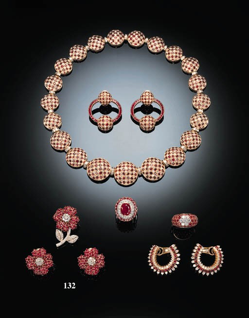 A PAIR OF RUBY AND DIAMOND FLOWERHEAD EARCLIPS