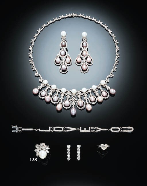 A SOUTH SEA CULTURED PEARL AND DIAMOND COCKTAIL RING