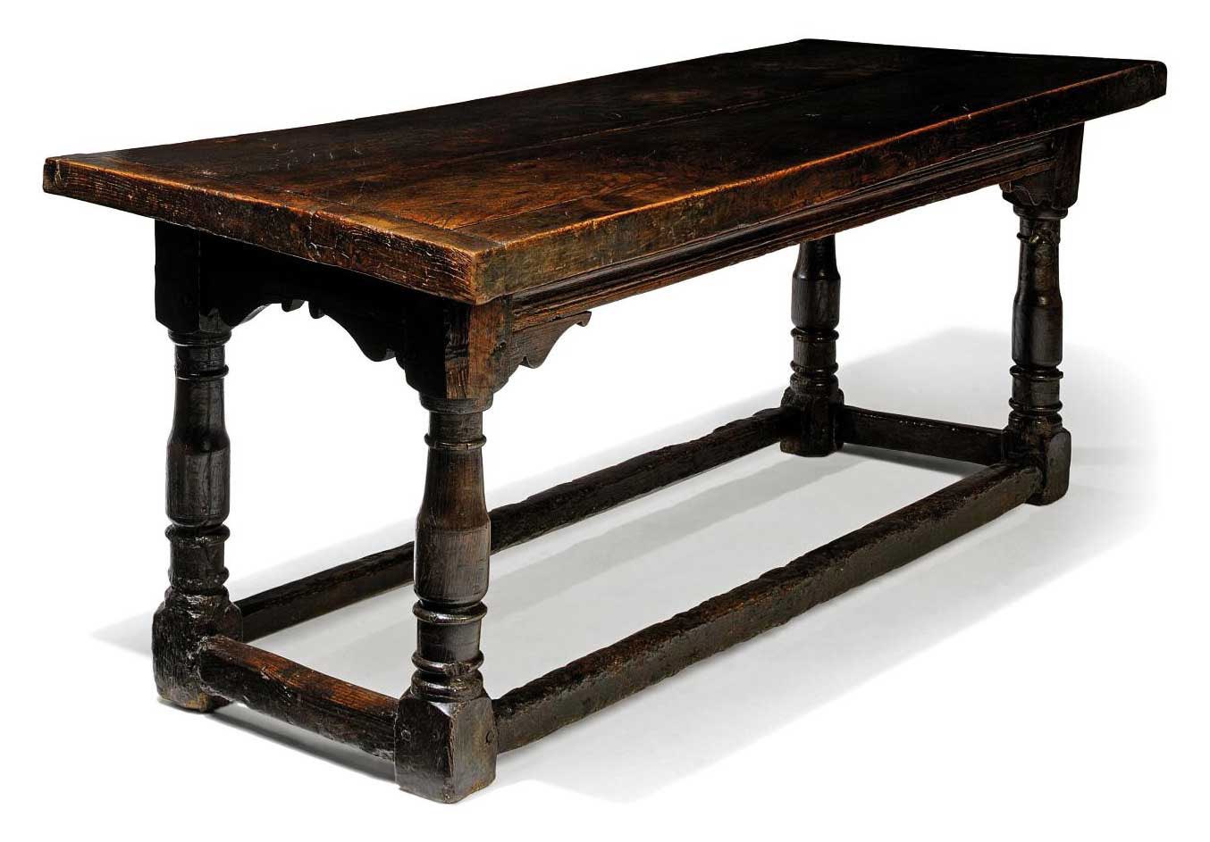 A CHARLES II OAK AND ELM REFECTORY TABLE