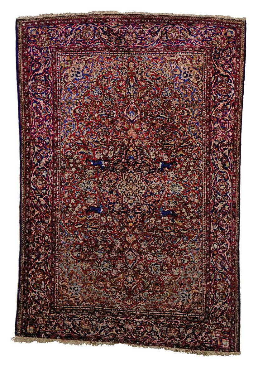 A KASHAN SILK RUG