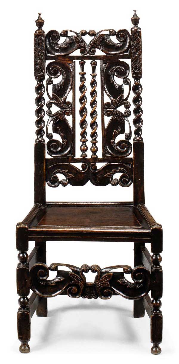 A CHARLES II OAK CHAIR