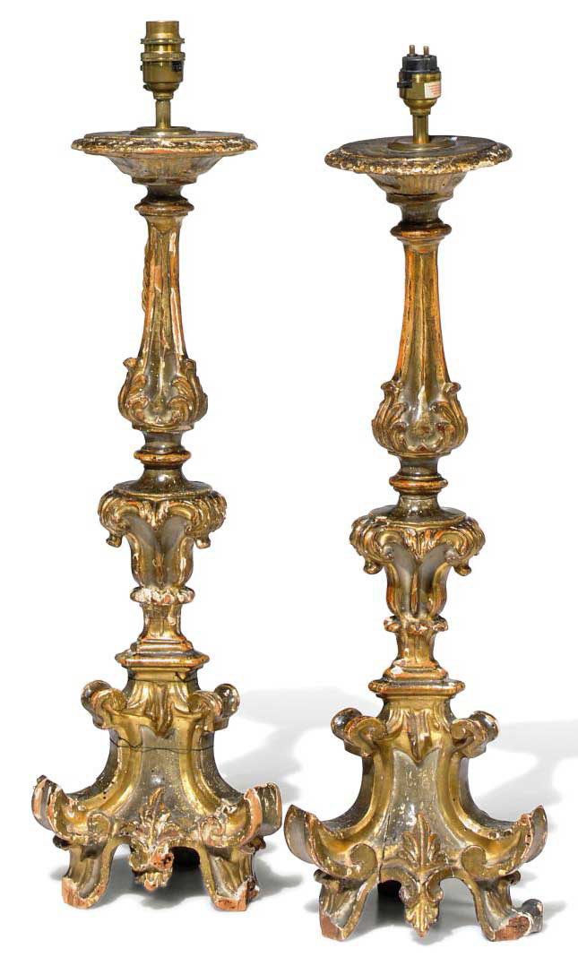 A PAIR OF AUSTRIAN OR NORTH ITALIAN SILVERED-WOOD ALTARSTICKS