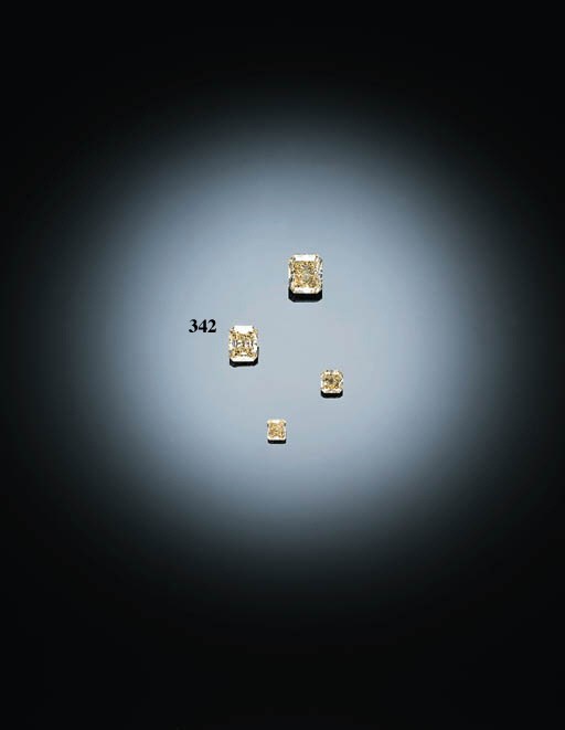 AN UNMOUNTED MODIFIED RECTANGULAR-CUT YELLOW DIAMOND