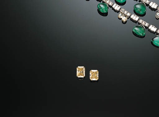 TWO UNMOUNTED MODIFIED RECTANGULAR-CUT YELLOW DIAMONDS