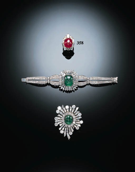 A CABOCHON RUBY AND DIAMOND CLUSTER RING, BY BULGARI